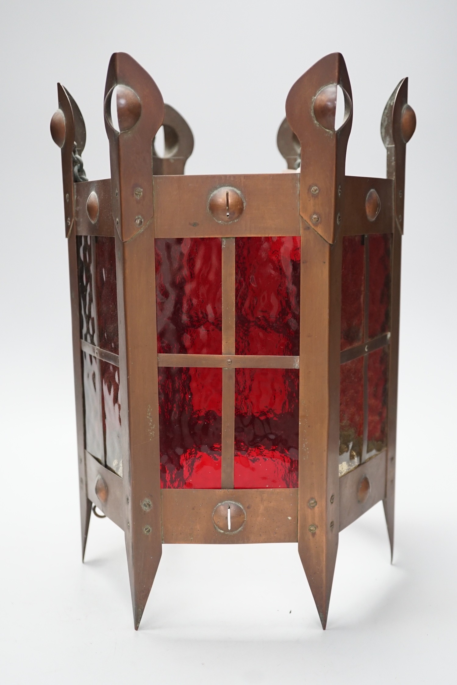 An Arts & Crafts copper and coloured glass hall lantern, 35cm